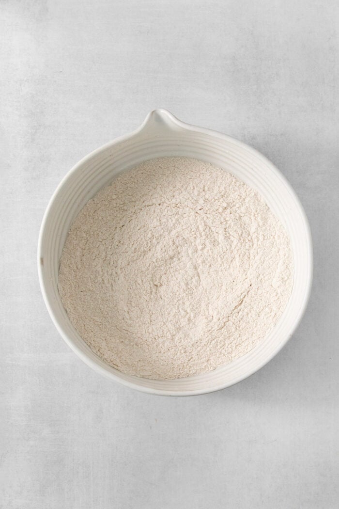 The dry mix for cottage cheese pancakes is shown in a white bowl.