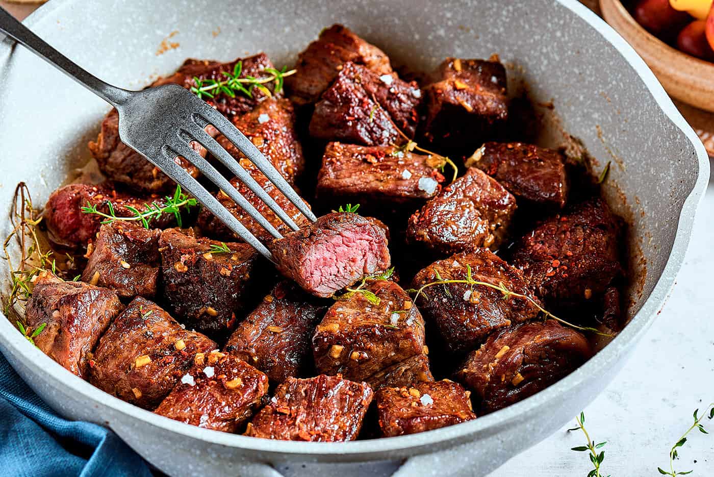 garlic butter steak bites in a skillet