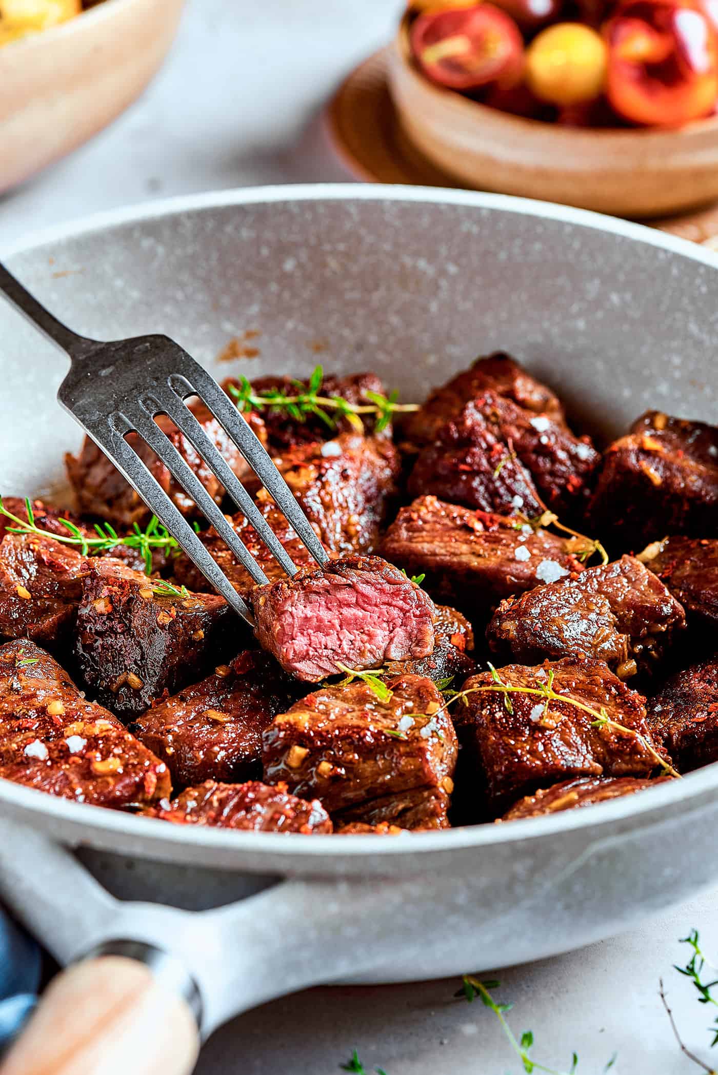 garlic butter steak bites in a skillet