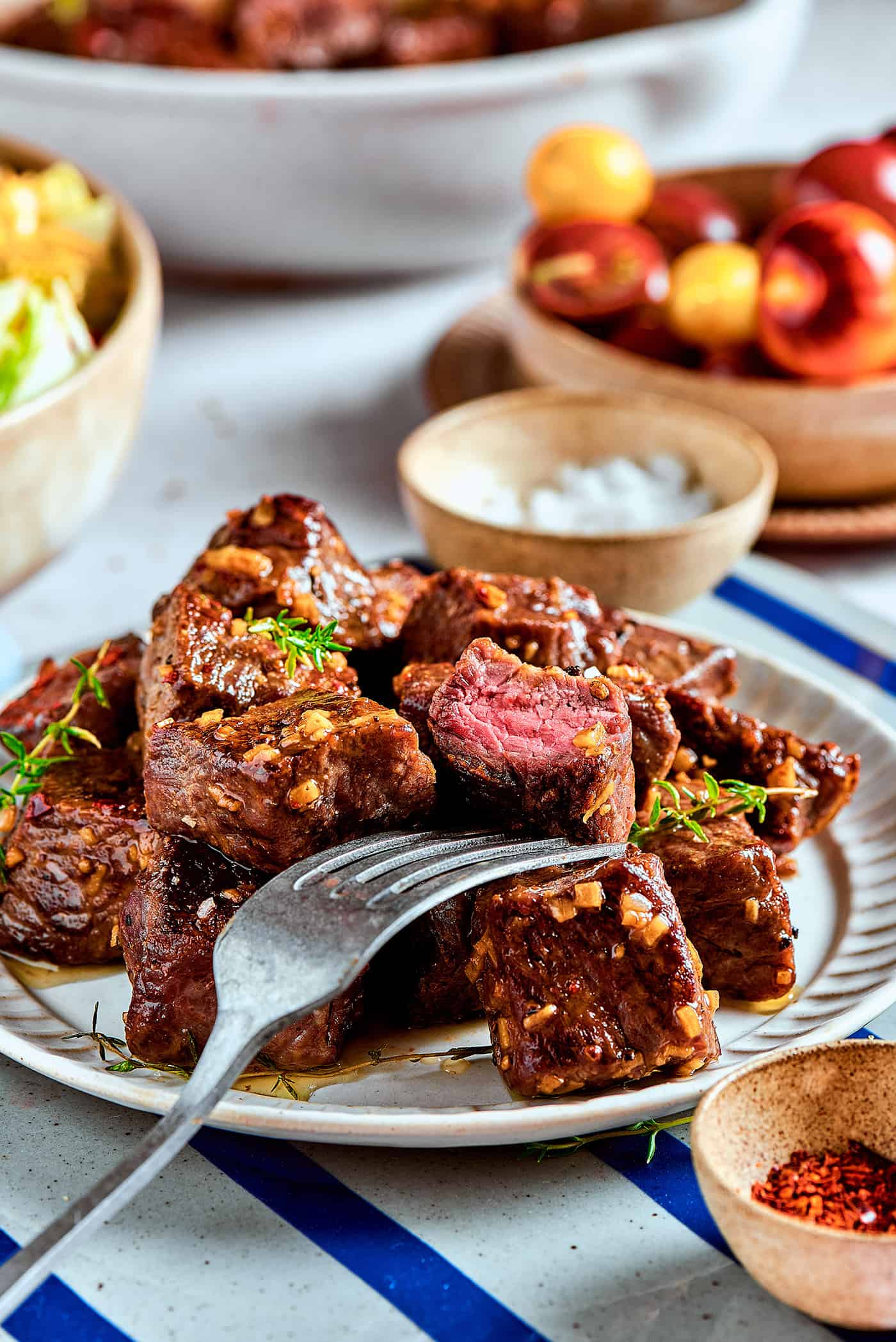 steak bites with garlic butter on a plate