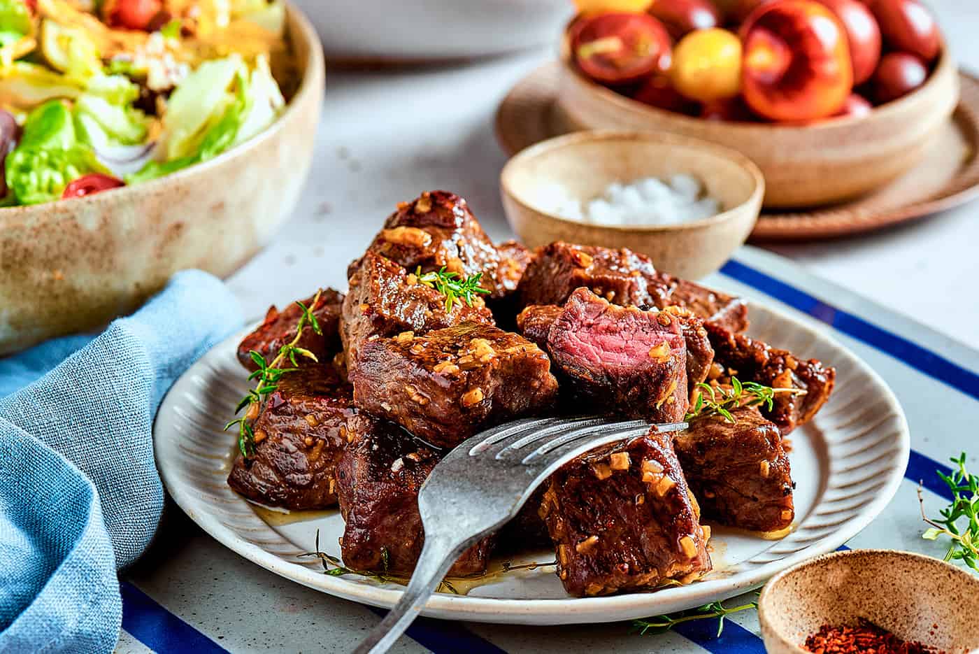 steak bites with garlic butter on a plate