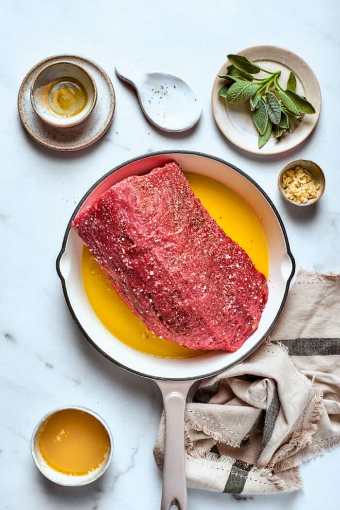 The roast is seared in olive oil.
