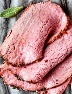 A close up of slices of top round roast.