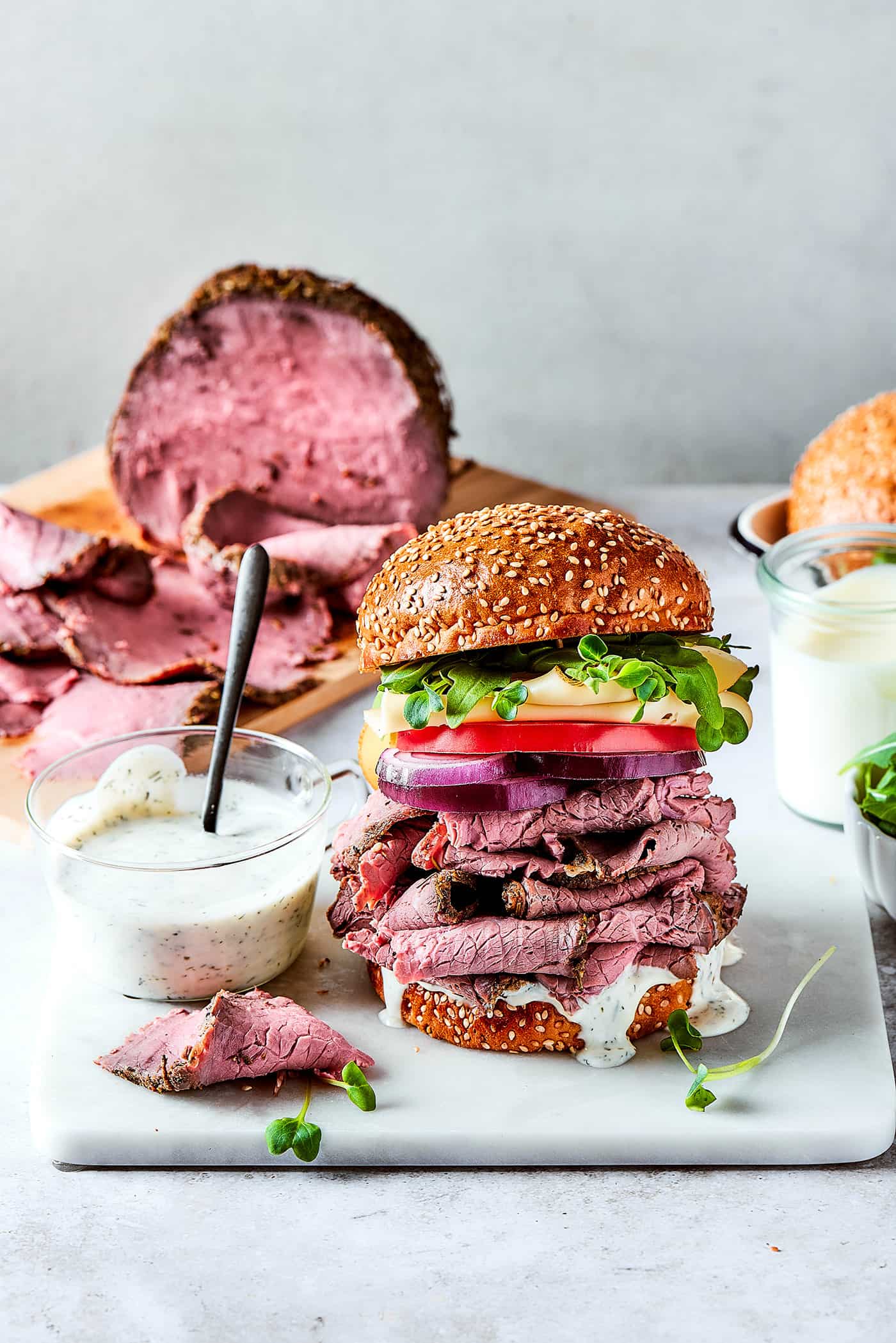 a table of ingredients for making an epic roast beef sandwich