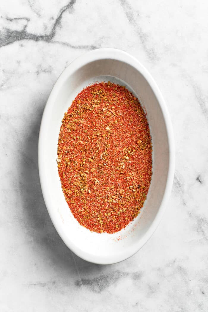 The spice mix is whisked together.