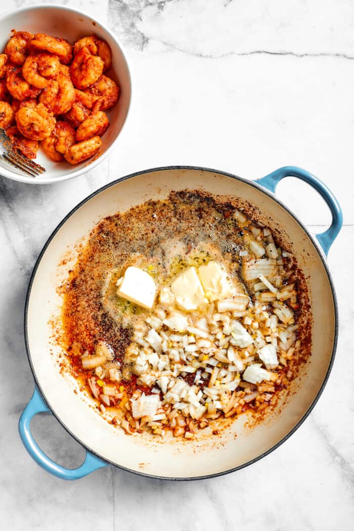 Butter is mixed in to the pot.