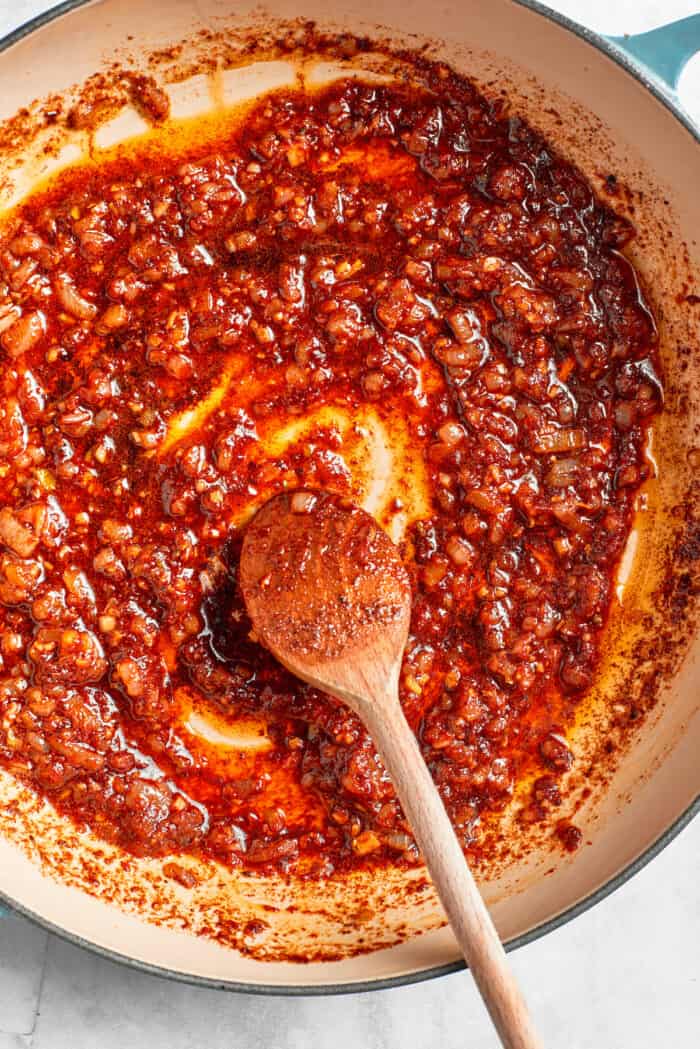 Spices come together to make a sauce base.