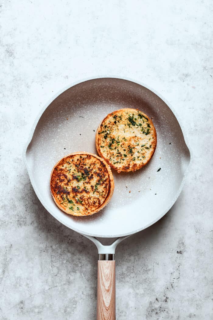 Blend two favorites to make this Pizza Burger recipe! Juicy beef patties are topped with tangy marinara, pepperoni, mozzarella & fresh basil. The burger buns are toasted in a skillet with herbs.