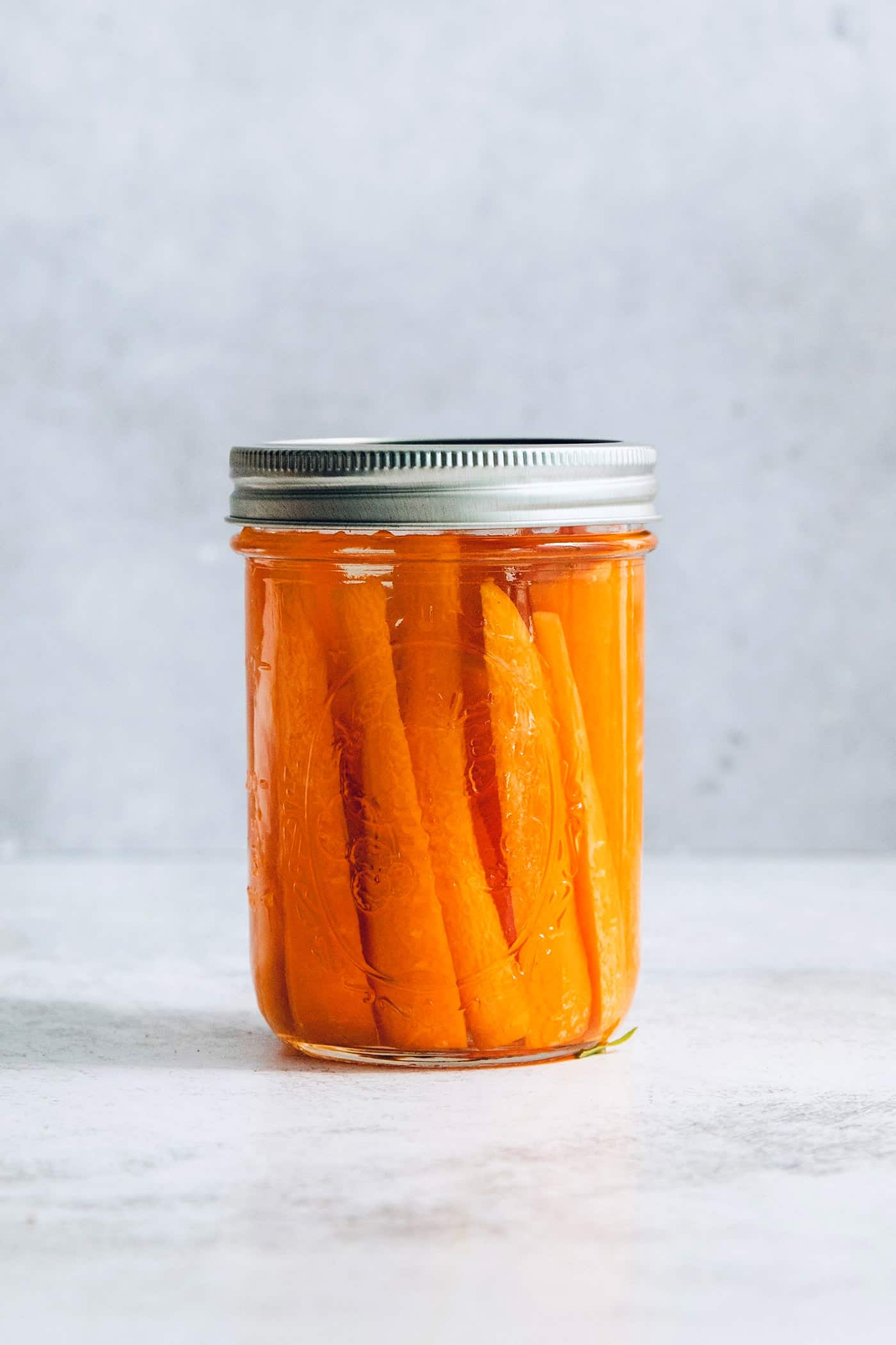 cut carrots in a jar with water