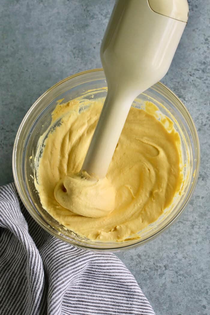 Using an immersion blender to make the filling smooth.