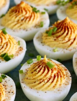 Pinterest image for easy deviled eggs recipe + 12 ways to garnish