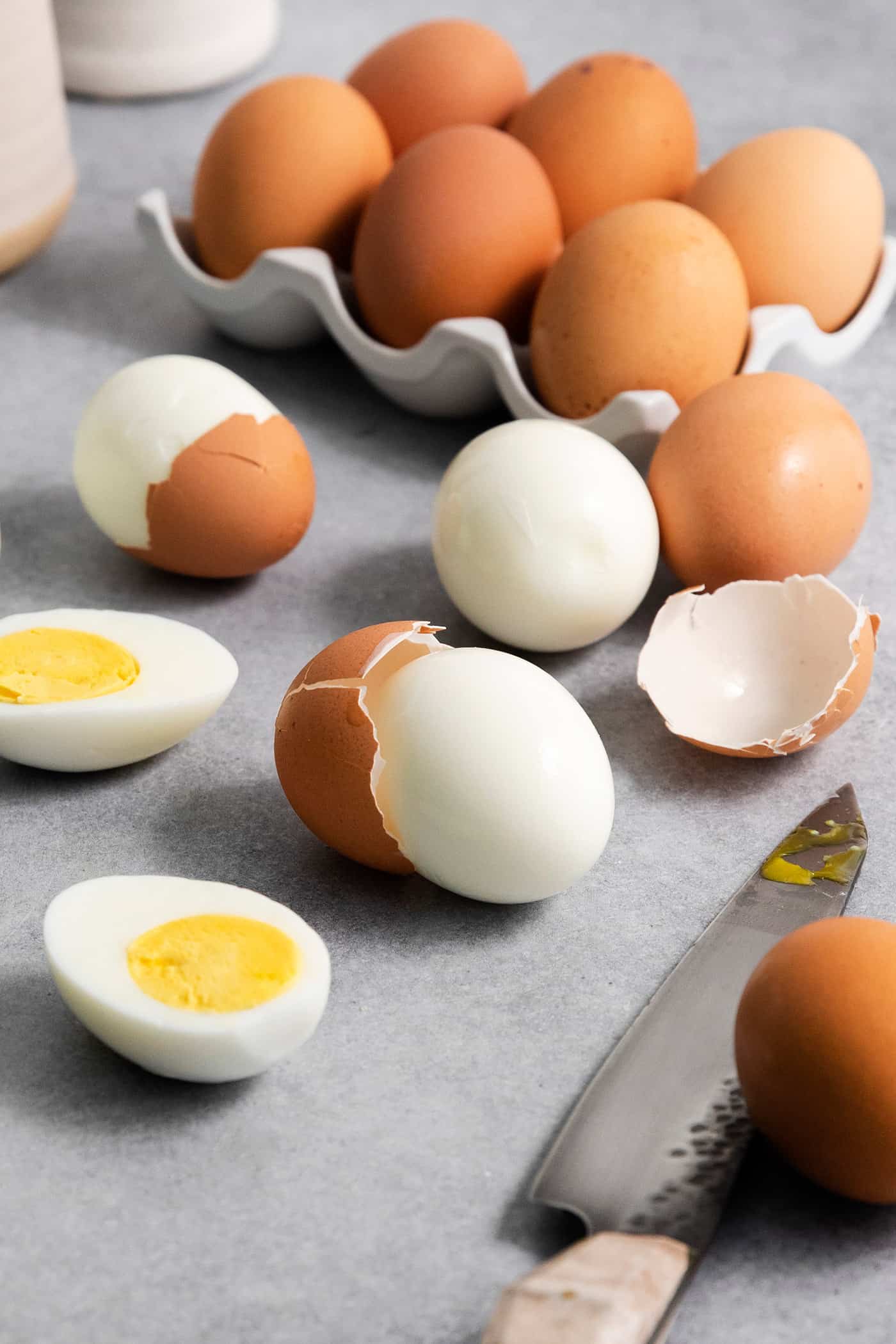 hard boiled eggs, some are peeled and cut in half