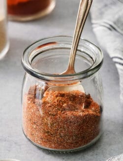 close-up photo of a jar of homemade blackened seasoning