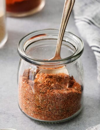 close-up photo of a jar of homemade blackened seasoning