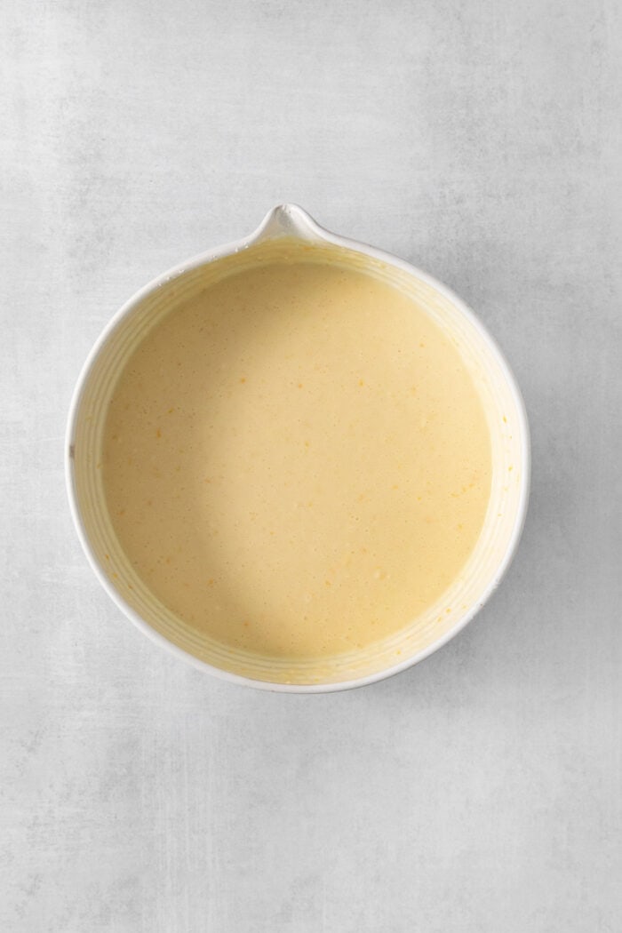 The bowl of crepe batter rests.