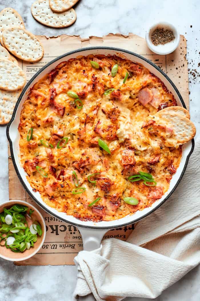 Overhead view of Reuben dip in pan with crackers