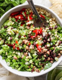 The cowboy caviar is served in a bowl.