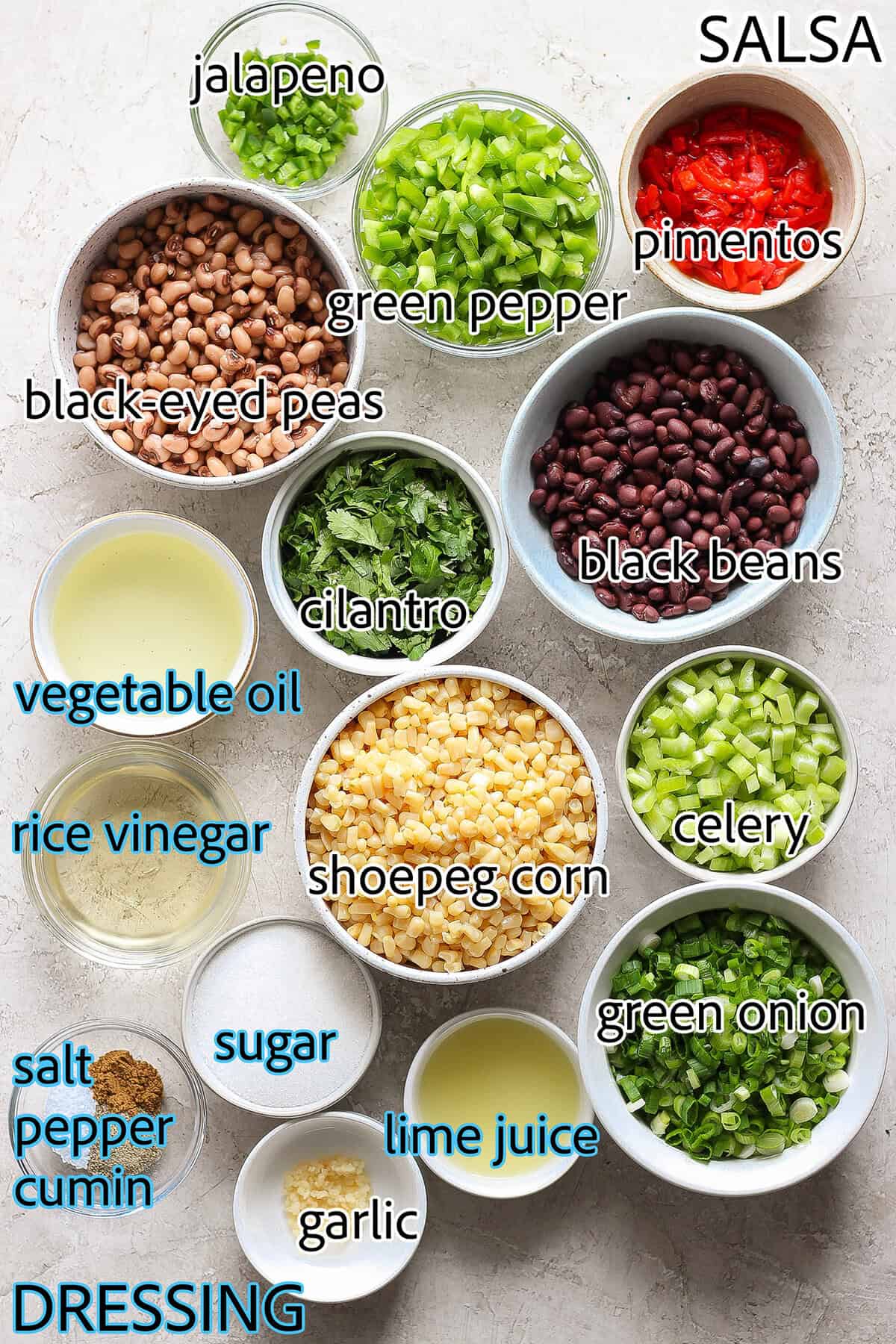 Ingredients for cowboy caviar are shown labelled: black eyes peas, black beans, corn, green onions, lime juice, rice vinegar, sugar, garlic, spices, pimentos.