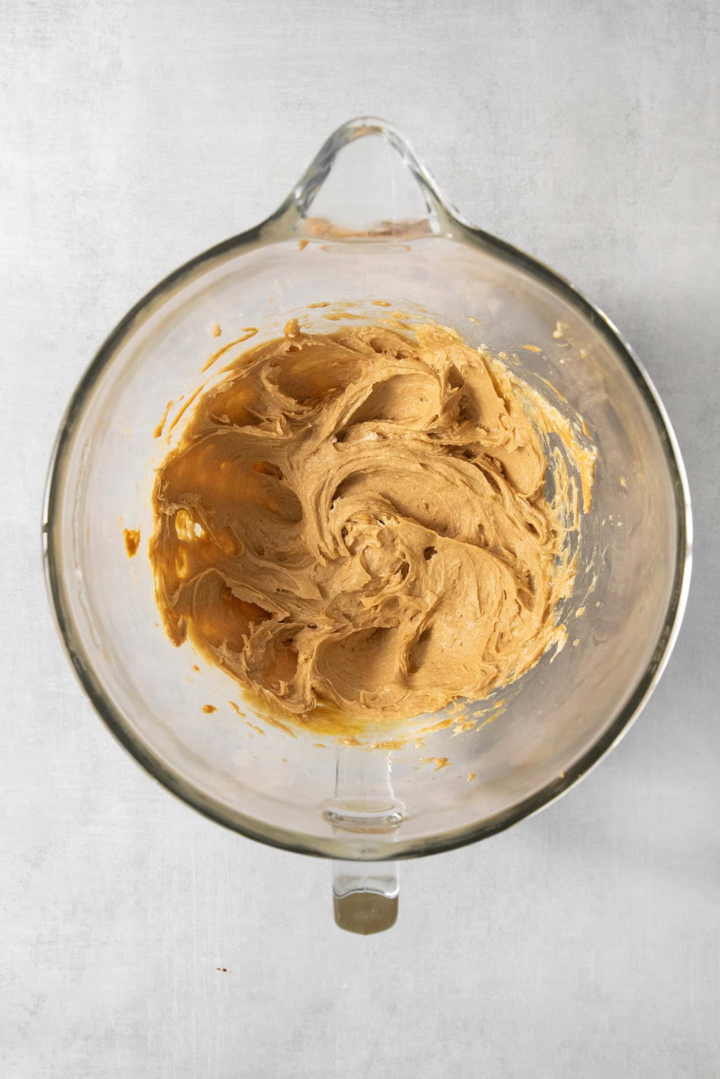 Peanut butter is mixed into the creamed mixture.