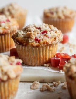 side view of rhubarb muffins with crumb topping