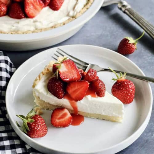 a piece of strawberry cream cheese pie on a white plate