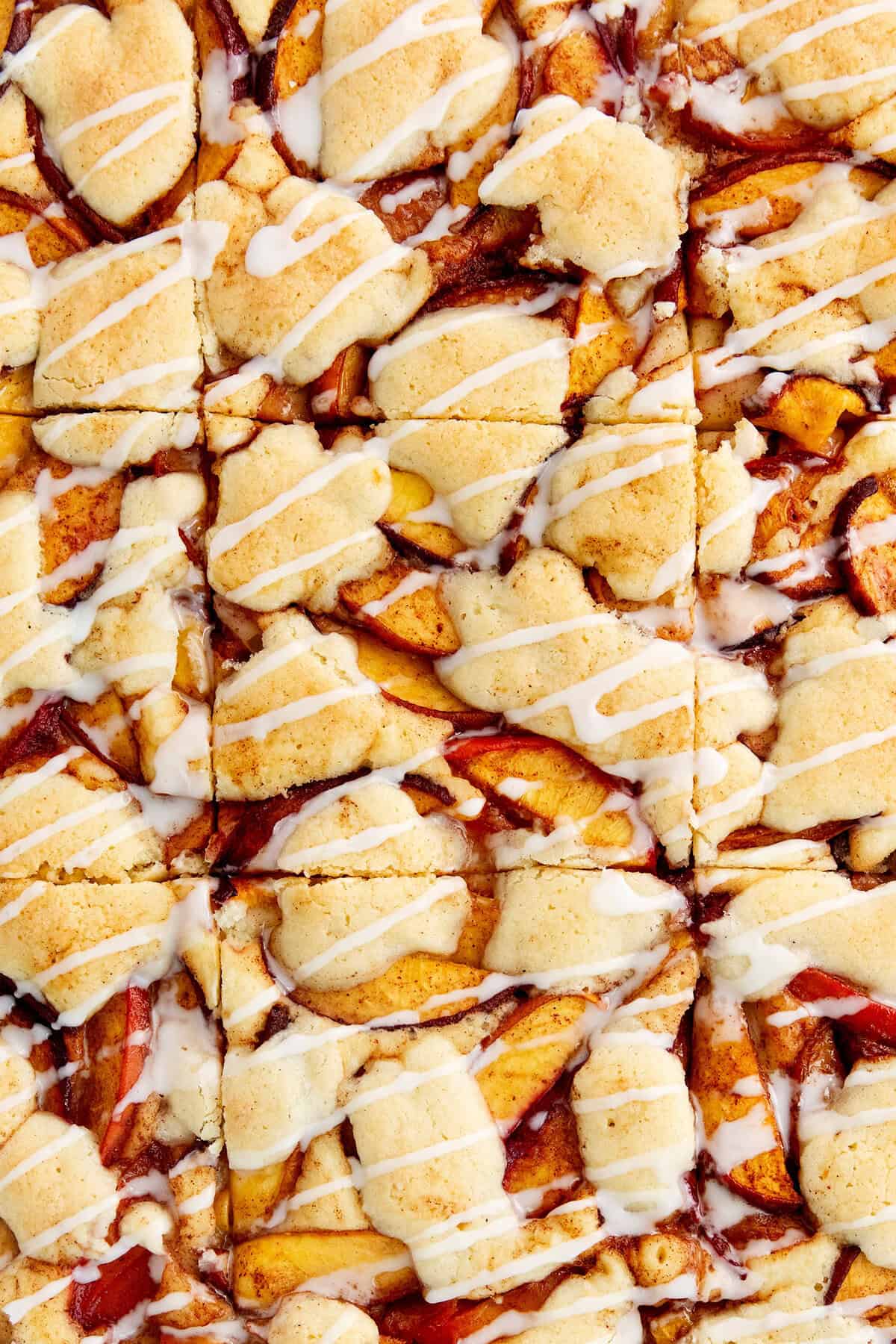Cuts are made in the peach bars.