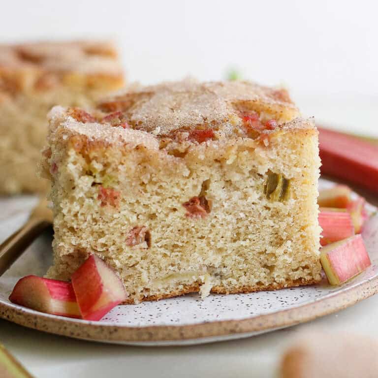 a piece of rhubarb coffee cake on a plate