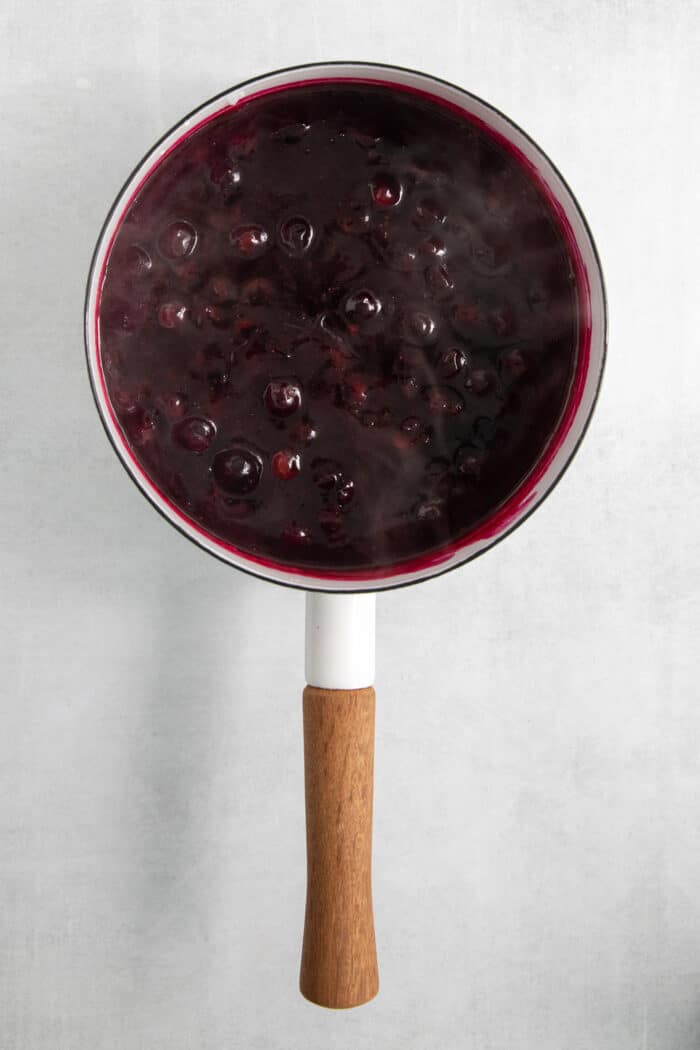 The blueberry sauce in a pot.