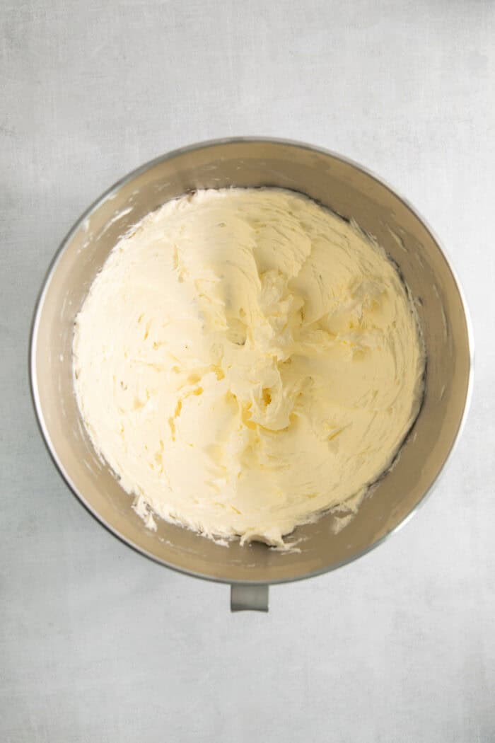 Butter is whipped until fluffy.