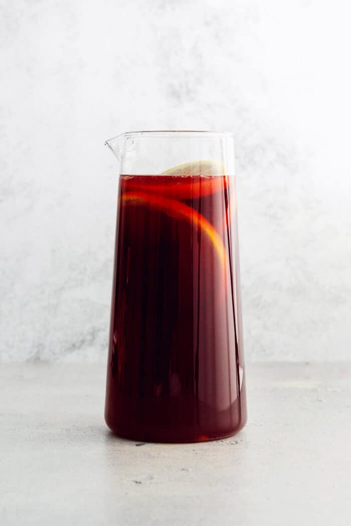 A glass pitcher of tinto de verano.