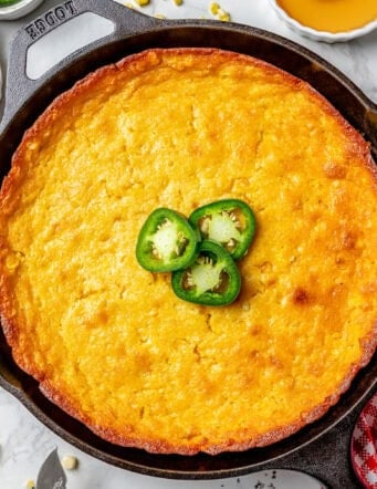 overhead photo of Jiffy corn casserole in a cast iron pan