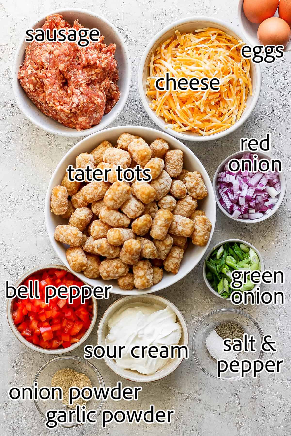 Labeled ingredients for making tater tot breakfast casserole. 