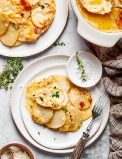 Scalloped potatoes on a serving plate.