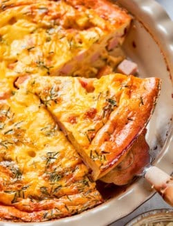 removing a piece of quiche without crust from a pie pan