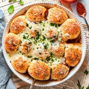pizza bites in a white baking dish