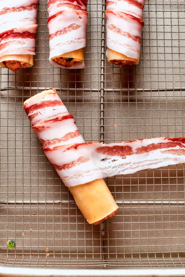 Wrapping bacon around pasta shells