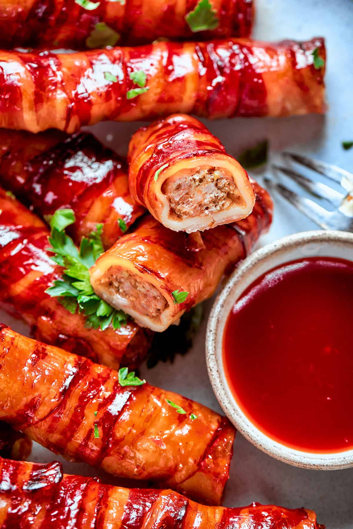 Shotgun shell cut in half to show meaty filling