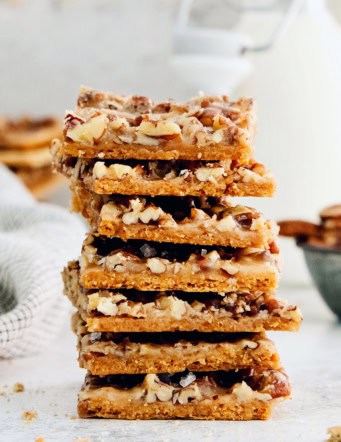 close-up photo of a stack of toffee pieces made with graham crackers
