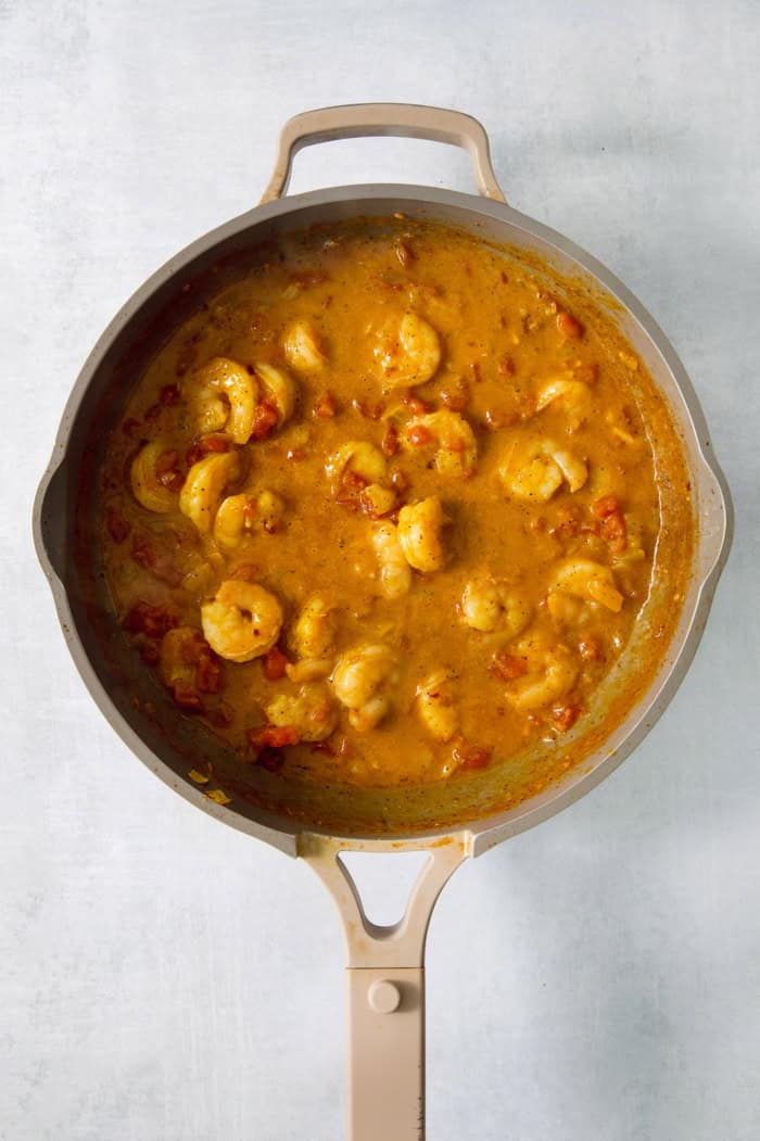 Overhead view of shrimp curry in pan