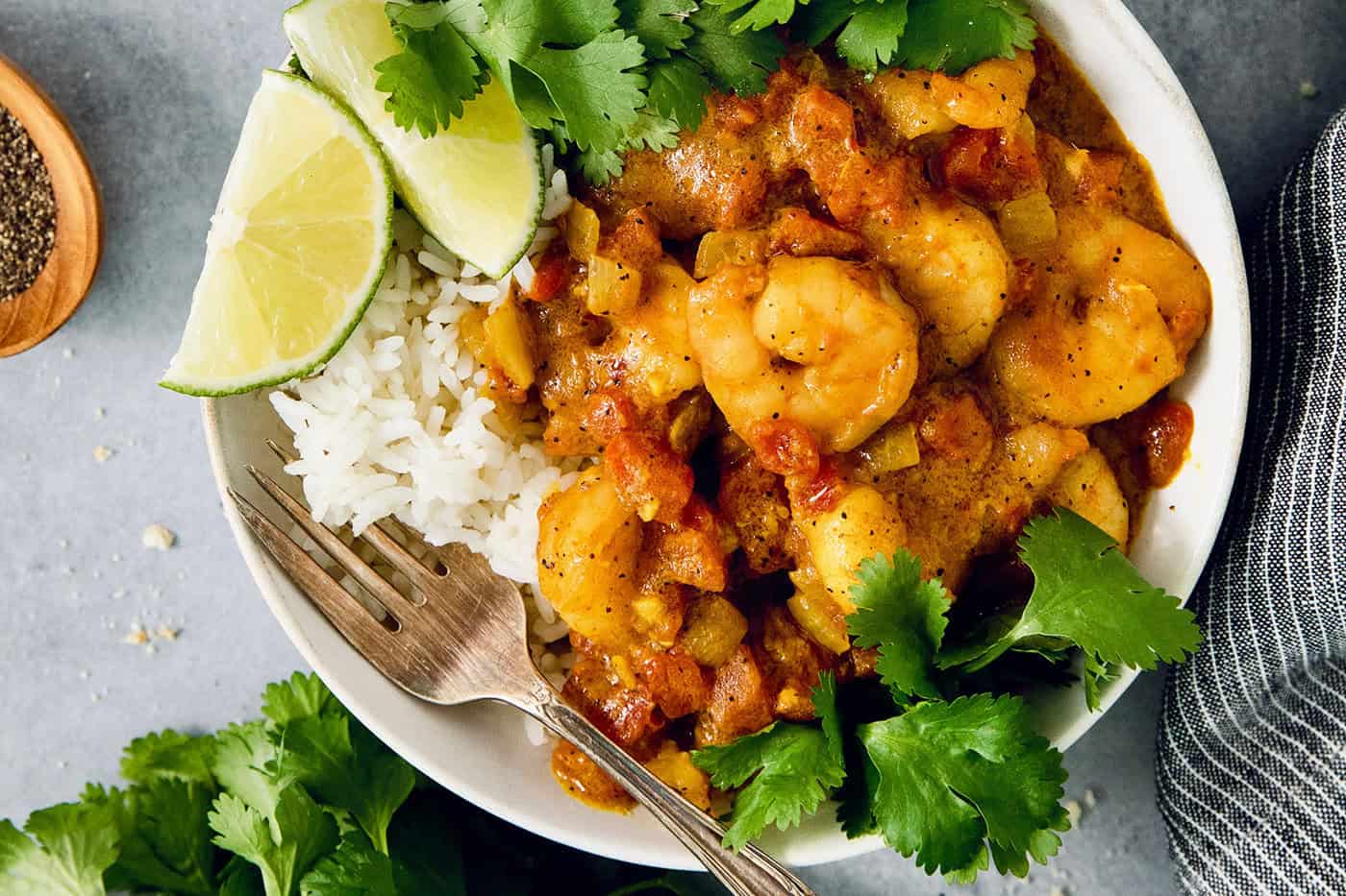 Shrimp curry in bowl with rice