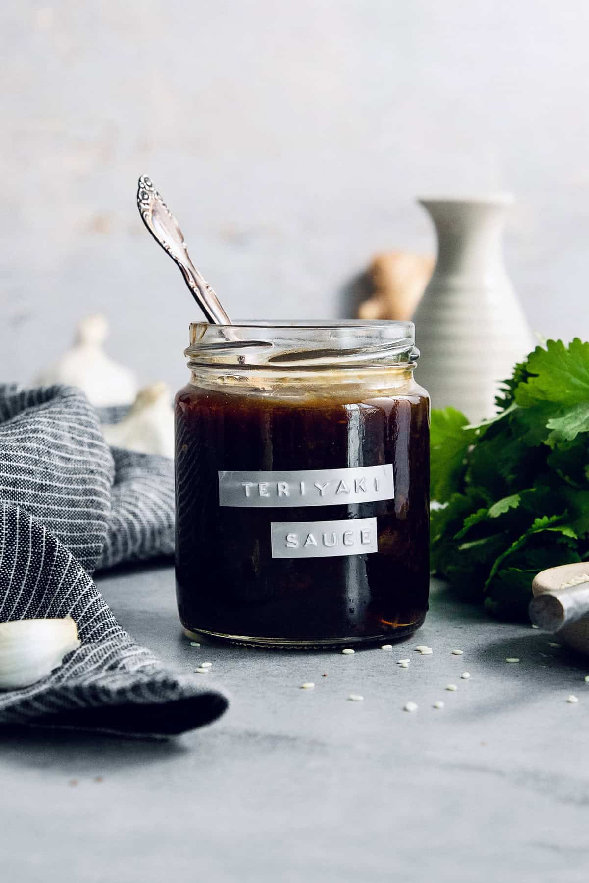 Jar of homemade teriyaki sauce with spoon