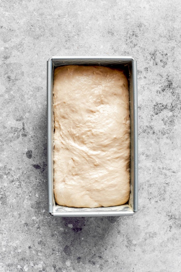 Overhead view of English muffin bread dough in pan