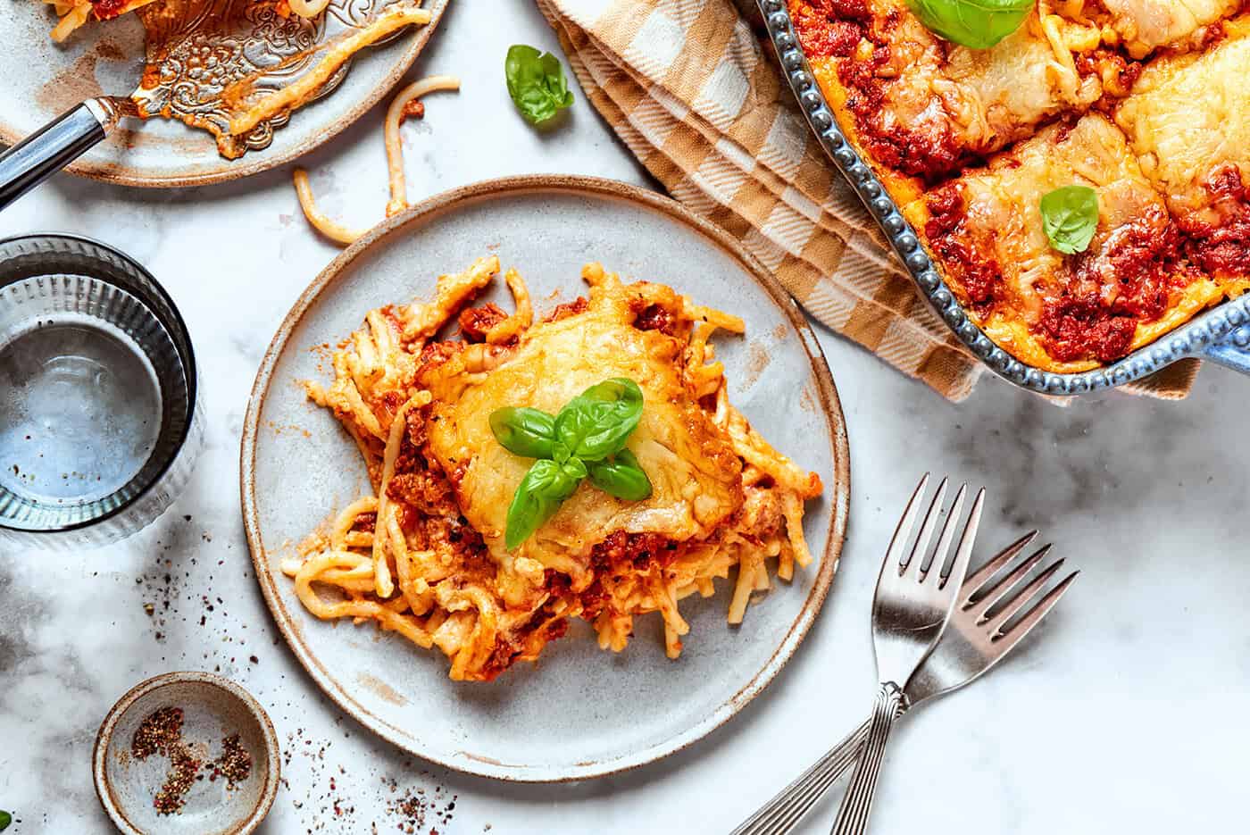 an individual serving of spaghetti casserole on a plate