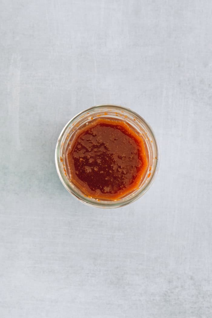 Overhead view of Hunan sauce in glass bowl