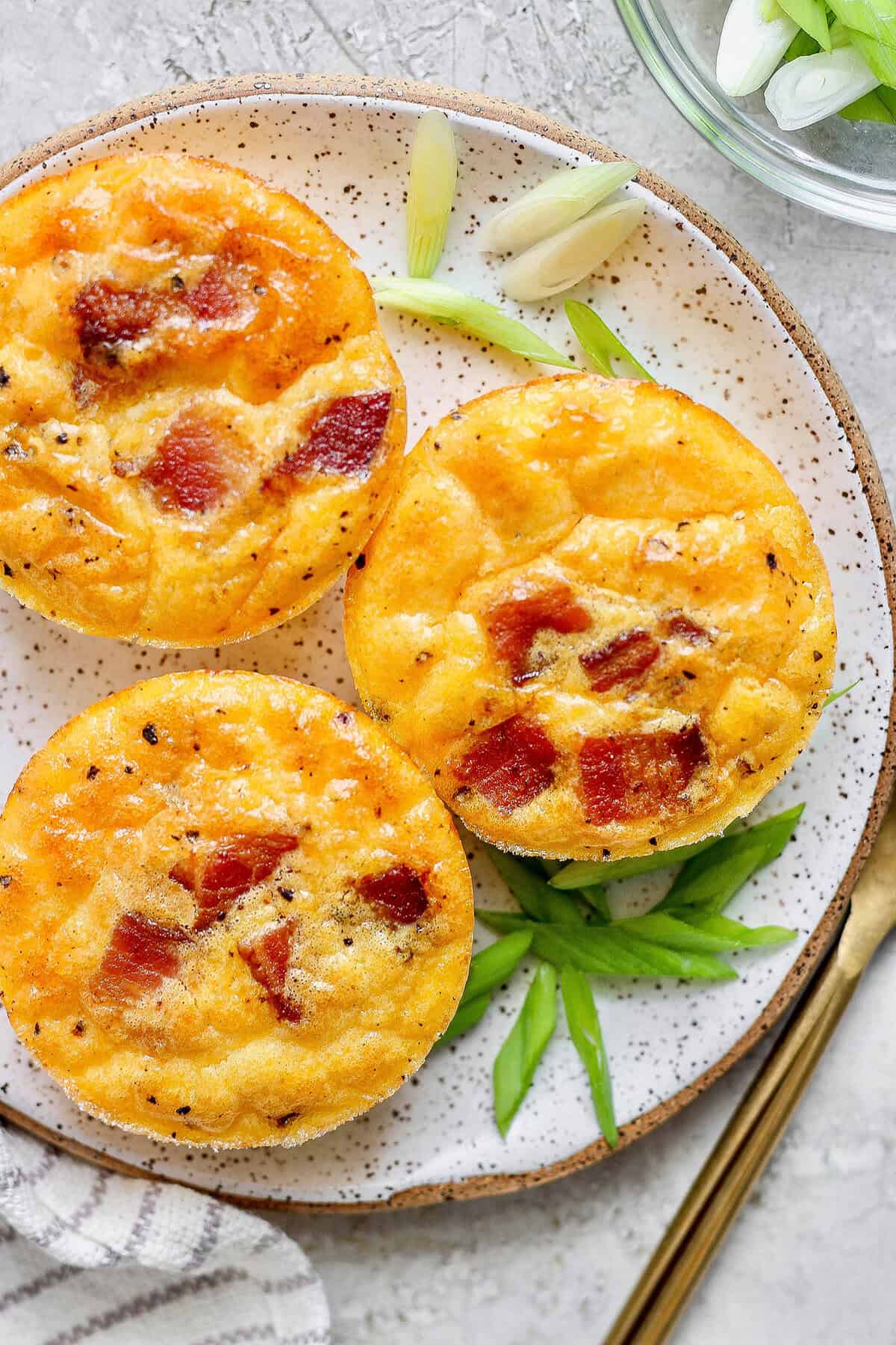 Overhead view of 3 bacon cottage cheese bites on plate