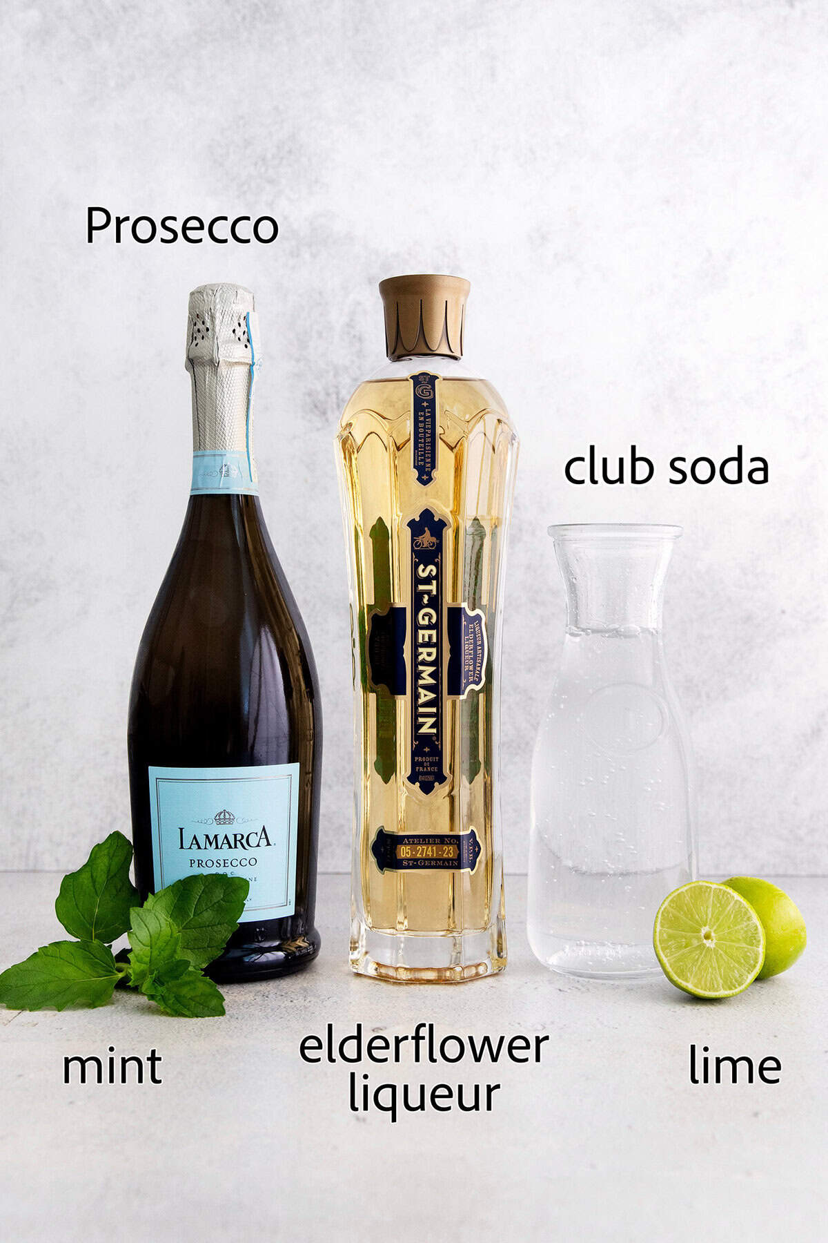 Overhead view of ingredients for Hugo spritz cocktail