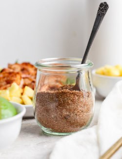 Jar of jerk seasoning with spoon