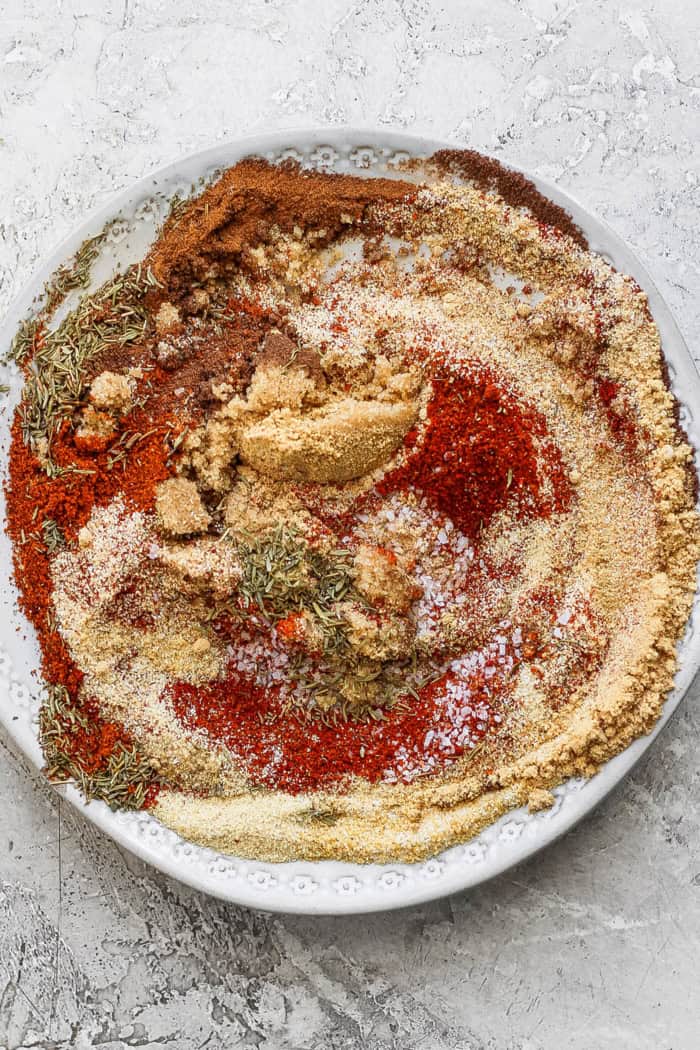 Overhead view of ingredients for jerk seasoning before mixing in bowl