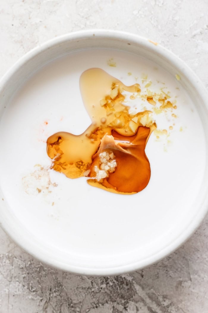 Ingredients for peanut sauce in bowl before stirring