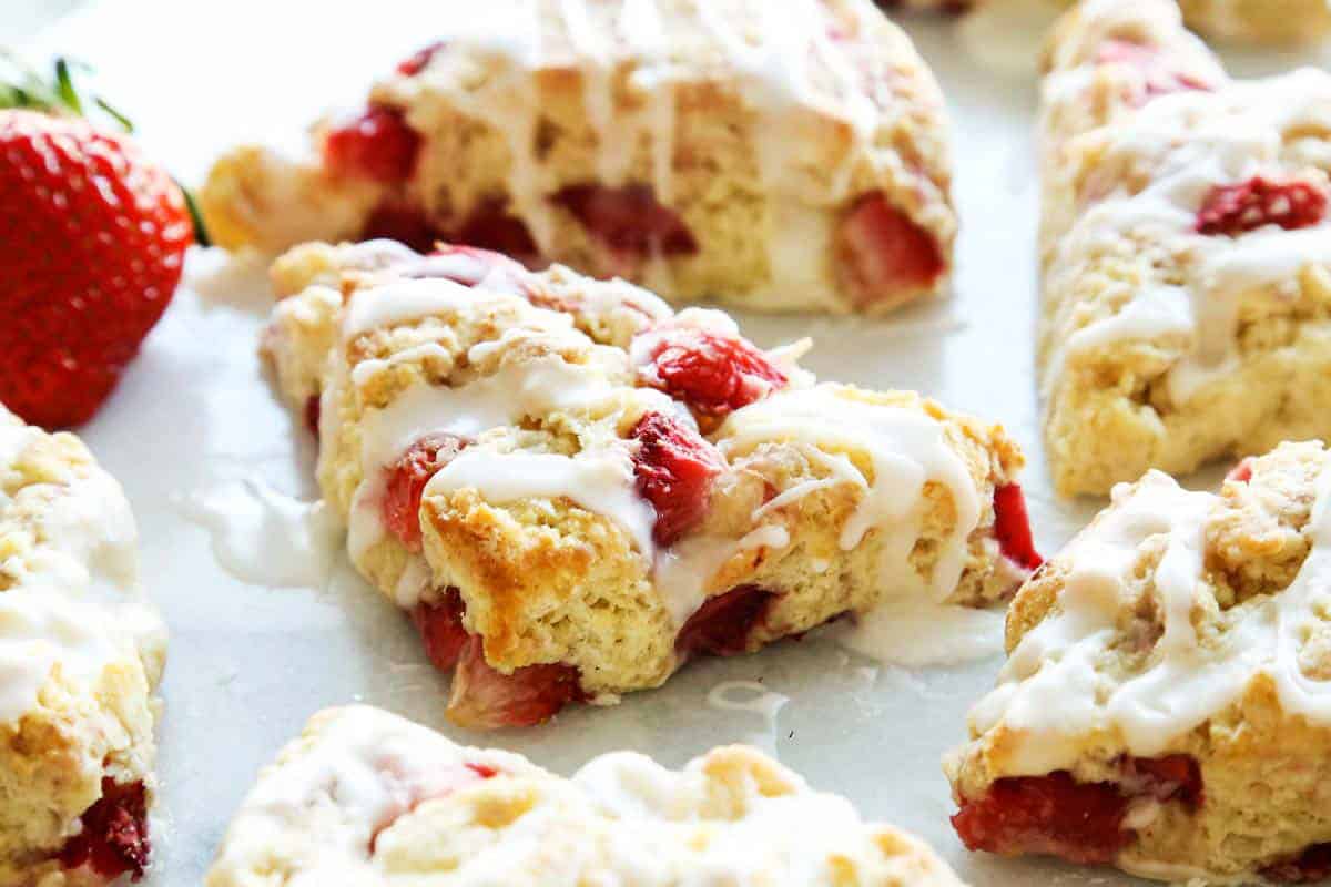 strawberry scones with fresh strawberries and a powdered sugar glaze